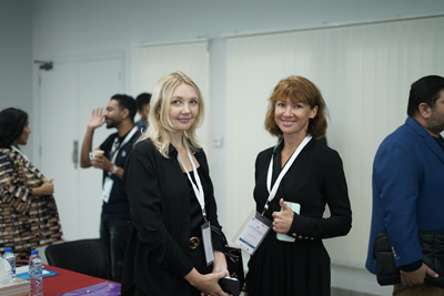 Two members in conversation between sessions